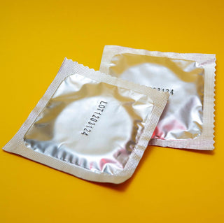 vegan condoms love in neon letters