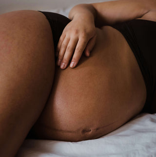 Pregnancy & Motherhood mother holding a baby