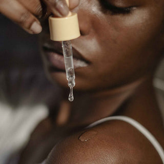 relaxation woman floating in a pool near the ocean